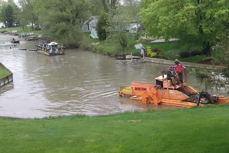 A man on a boat in the water.